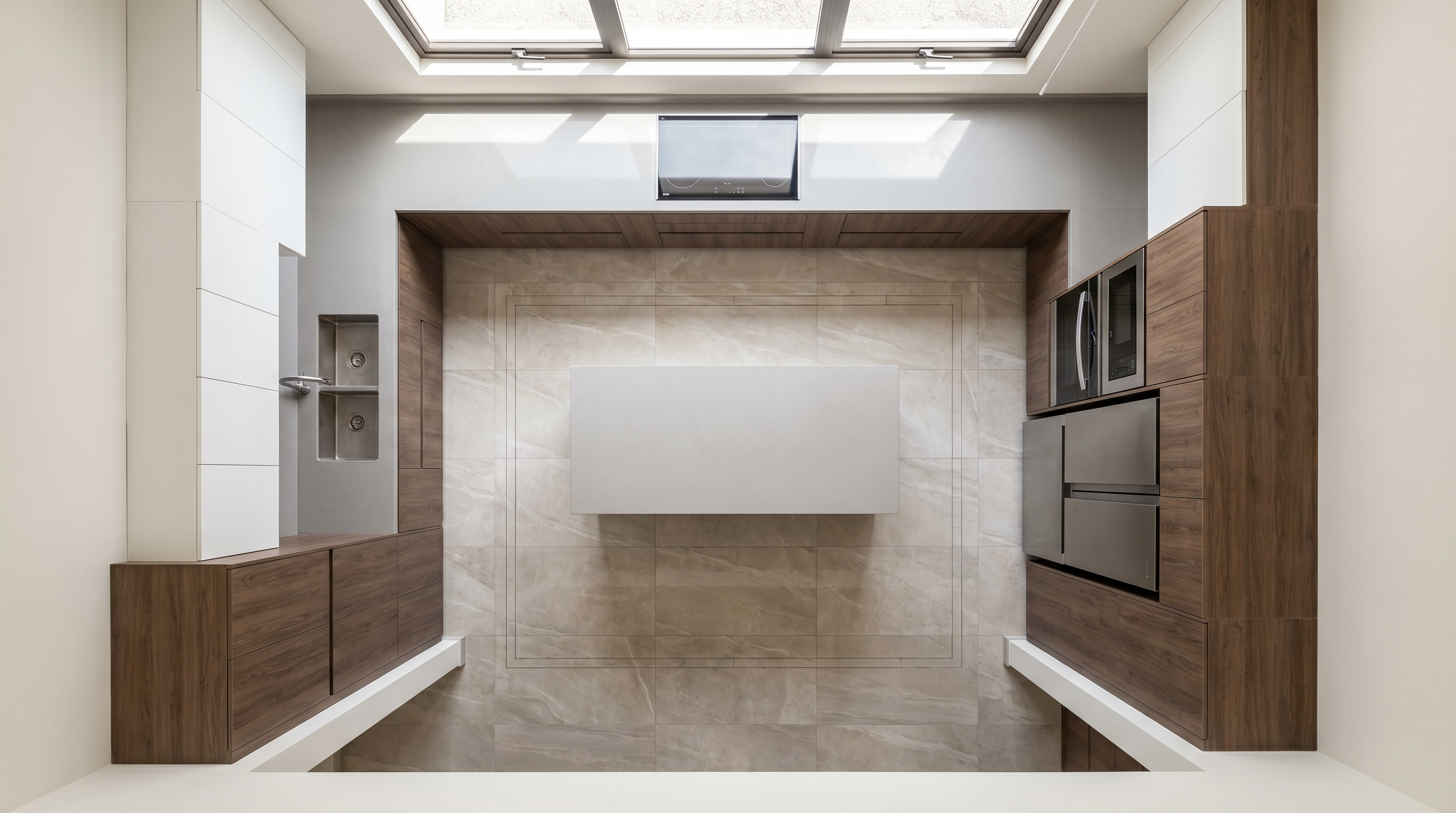 Vista cenital de cocina integral en L con isla central en residencia de Chihuahua